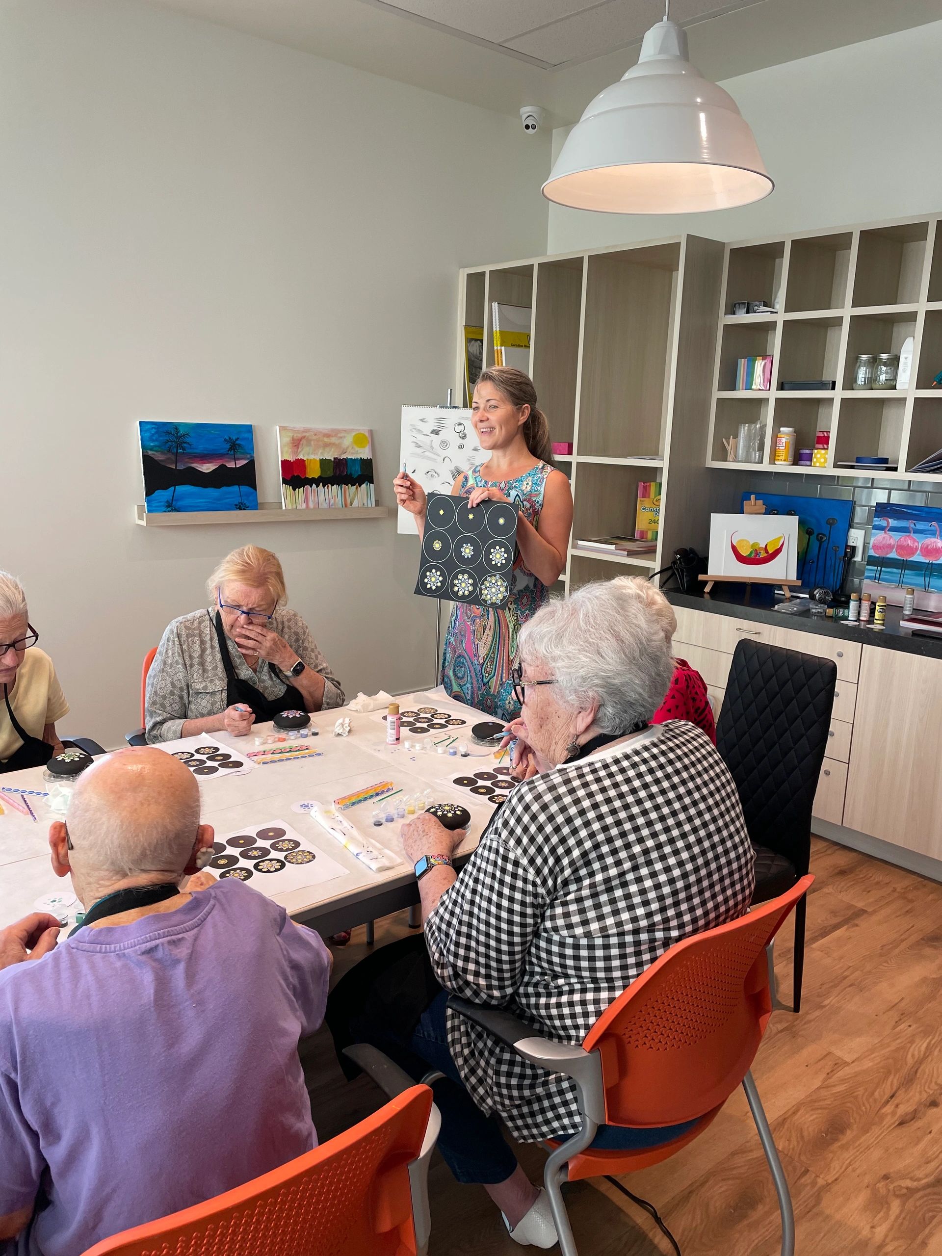 Class participants painting together
