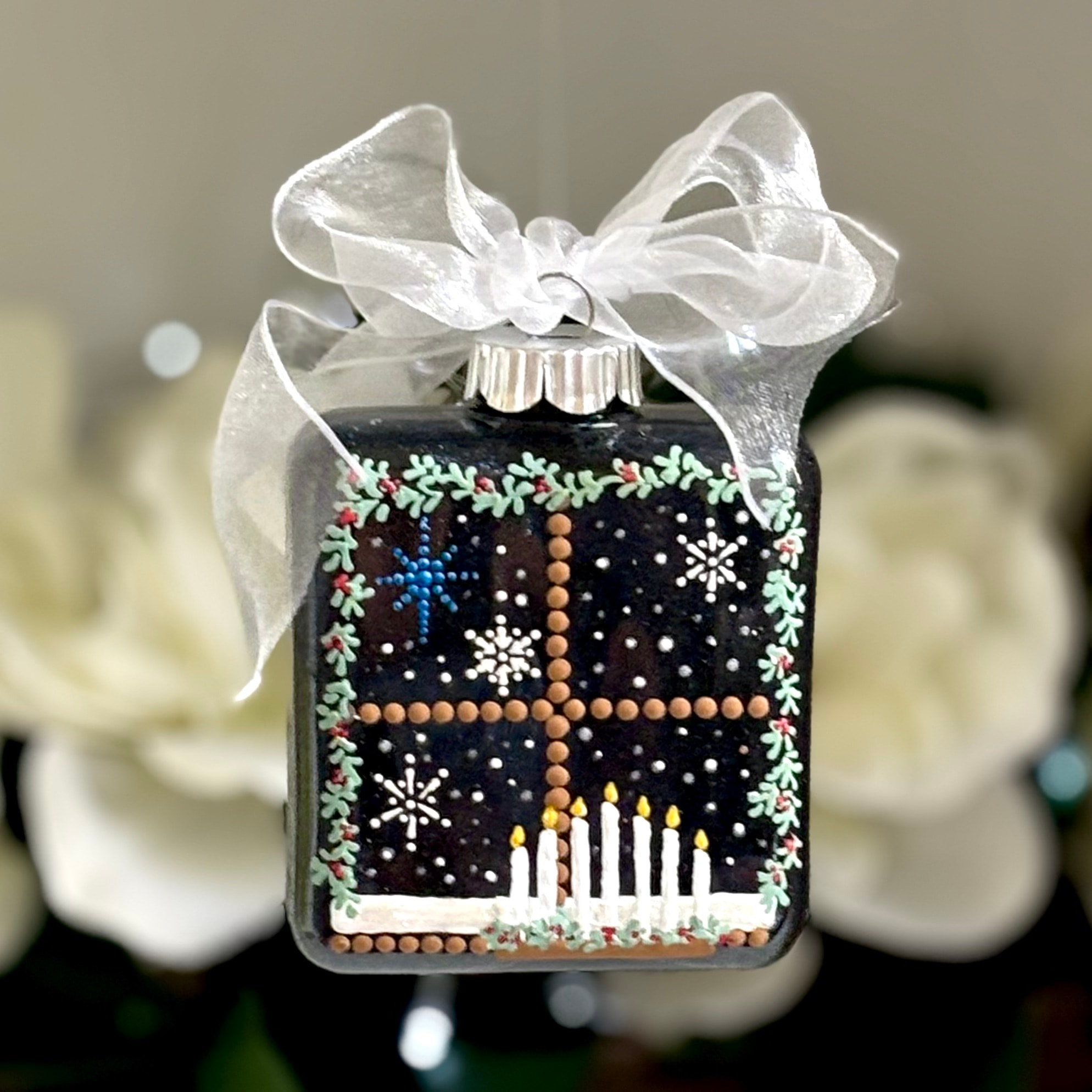 Hand painted square ornament with snowflakes and candles with white bow